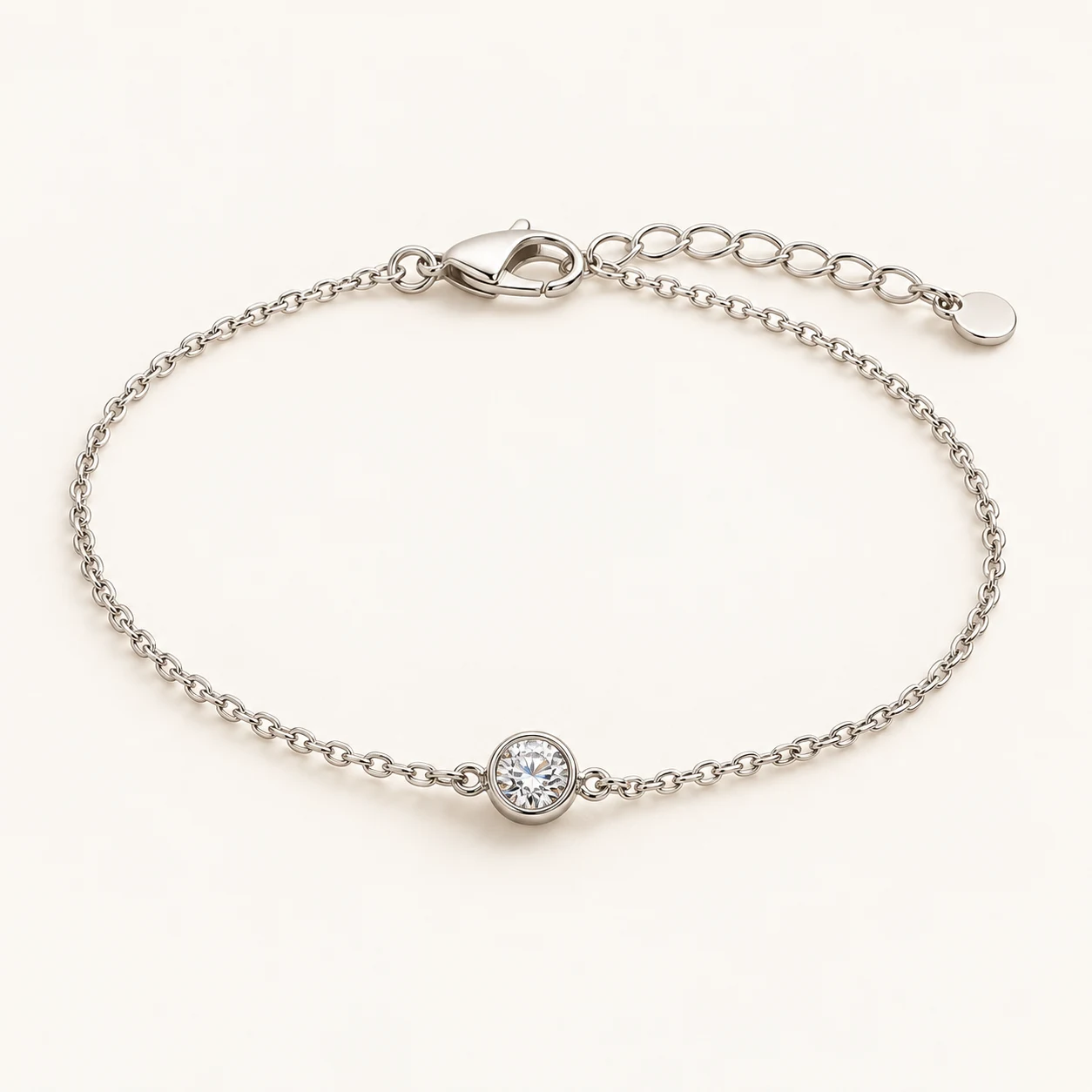 Petite Spark in Silver, fine chain bracelet, exactly one small ROUND clear cubic zirconia in a bezel at center, lobster clasp, extender