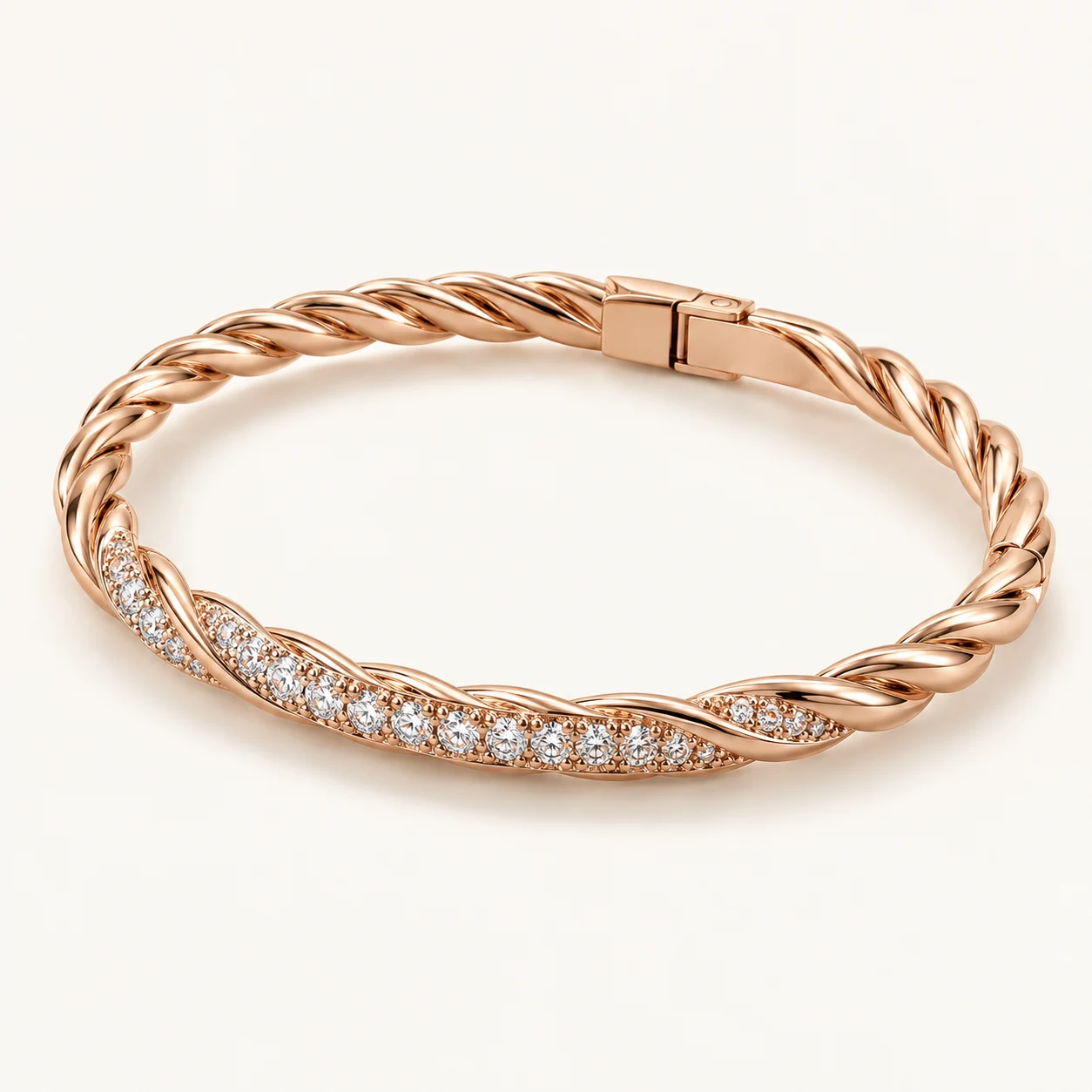 Roselle Twist in Rose Gold, hinged oval bangle bracelet, twisted rope sculpted band with narrow pave set clear cubic zirconia front arc